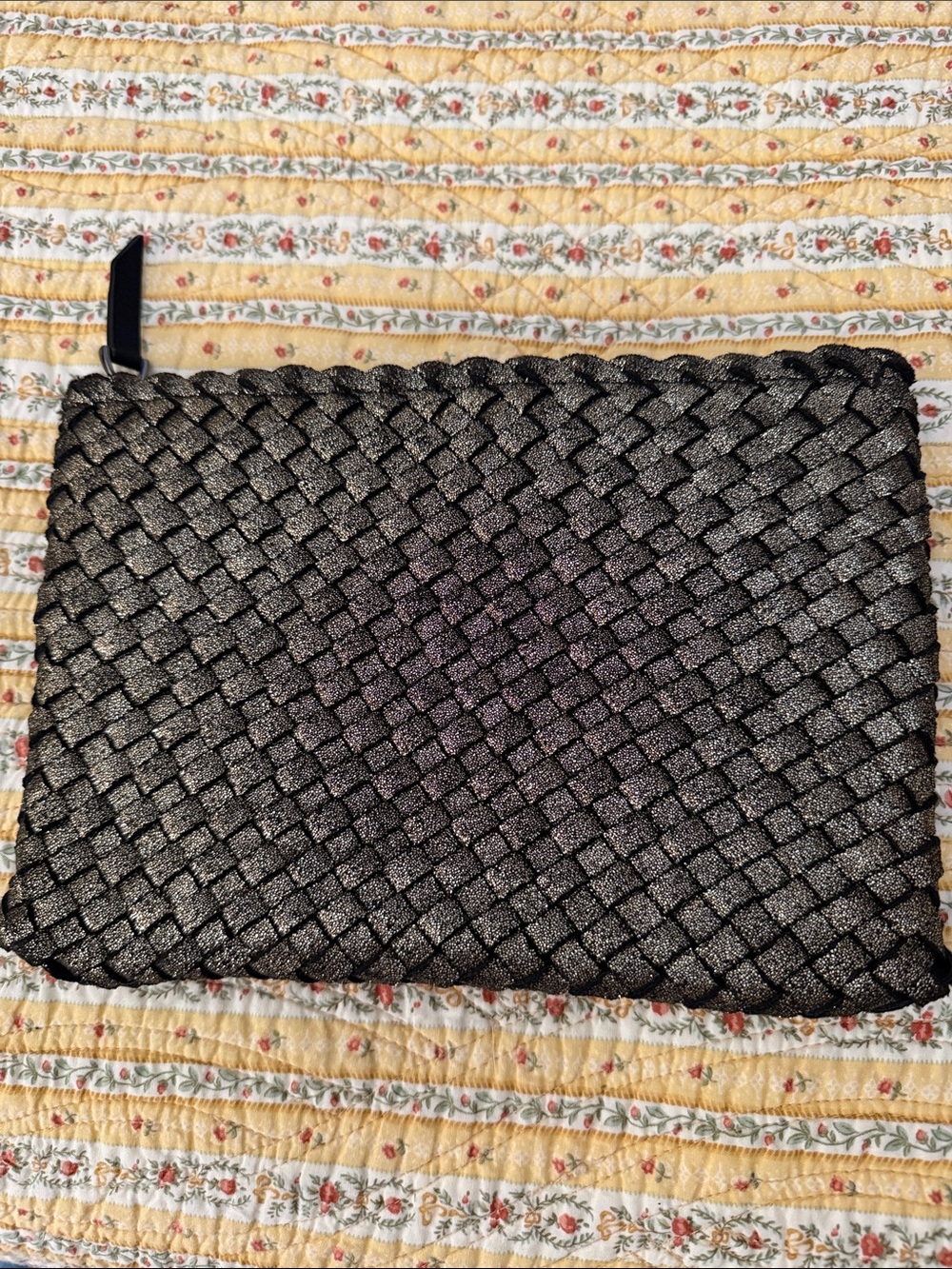 Naghedi zip pouch
Black and gold woven